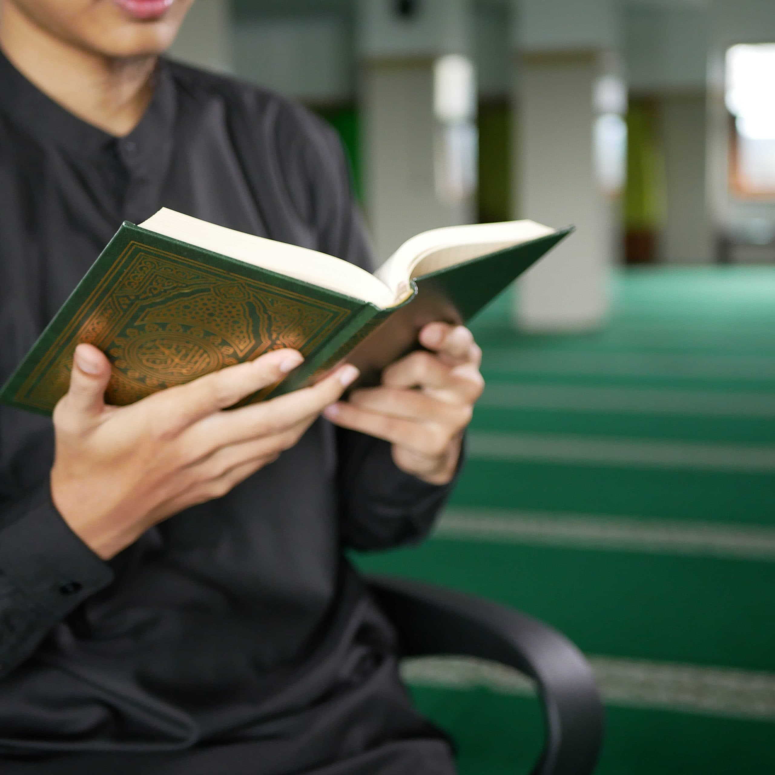 Student reading Quran